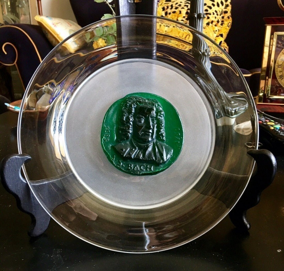 Daum Crystal France Pate de Verre 1970 Bach Plate: Limited Edition Daum France Pate de Verre Grand Musicians Series Bach Plate. Numbered 498/2000. Signed and dated "Daum 1970 Made in France". Measures 9.5"D. In house shipping to continental US $25.