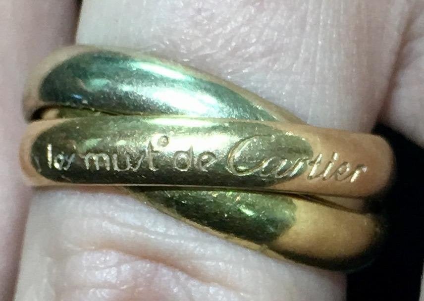 Must De Cartier Trinity 18K Gold Ring Size 6: Must De Cartier Trinity 18K Gold Ring Size 6 (marked 52 European). In house shipping to continental US $15.