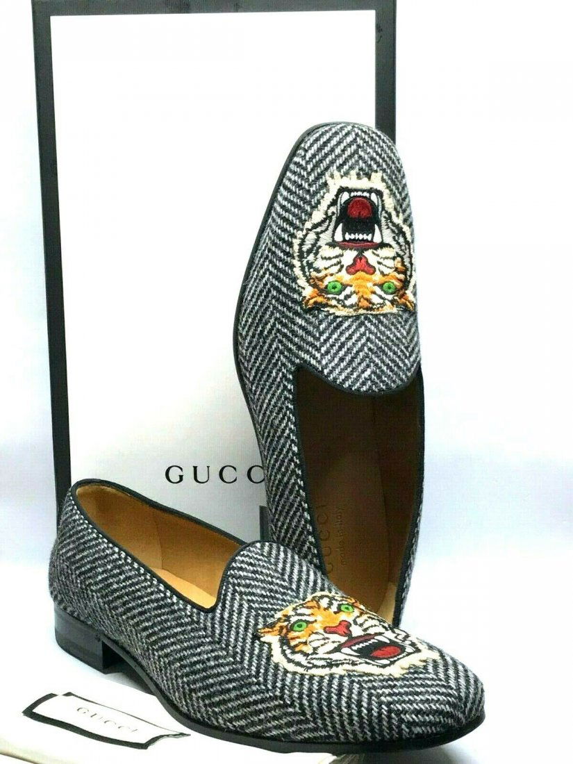 GUCCI Herringbone Tiger Head Men's Loafer Shoes: GUCCI 500872 Herringbone Tiger Head Fabric Black/White Men's Loafer Size:8.5. Brand NEW. Come with box and dust bag. In house shipping to continental US $25.