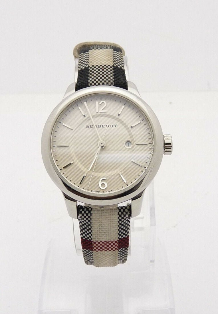 BURBERRY Classic Round Women: BURBERRY The Classic Round Women's Horseferry Quartz Watch. Stainless steel Case Size - 32mm W/ lugs. Band Length - 175mm. In house shipping to continental US $10.