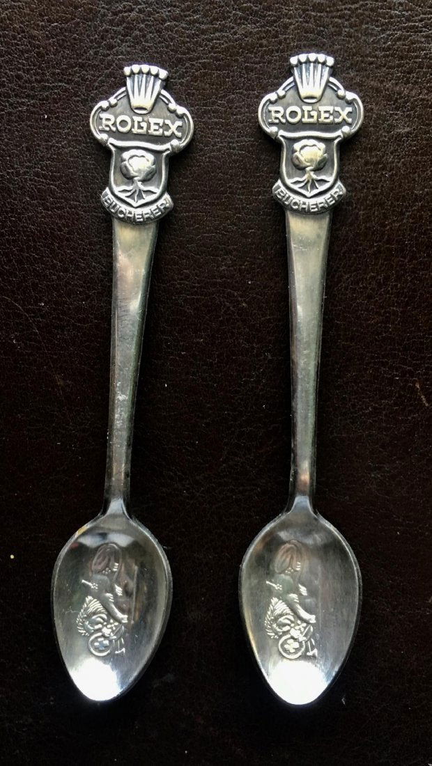 Pair of Rolex Spoons Collectible Souvenir: Pair of Rolex Child Spoons Collectible Souvenir Bucherer of Switzerland. Each measures 4" long. In house shipping to continental US $10.