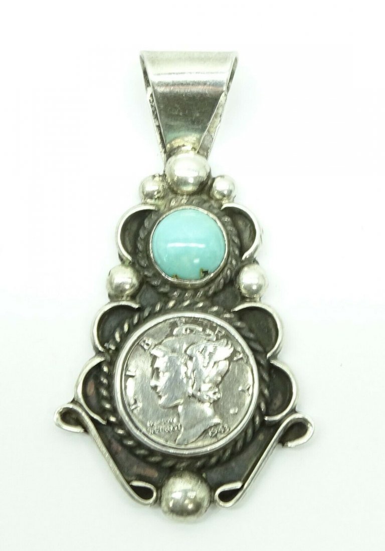 Navajo Sterling Silver Turquoise Coin Pendant WS: Navajo Sterling Silver Turquoise & 1943 Mercury Silver Dime Coin Pendant by (WS) Willie Shaw. TOTAL WEIGHT: 20.4 g, 13.1 dwt. SIZE: apprx L apprx L 2.5" W 1.5". In house shipping to continental US $10