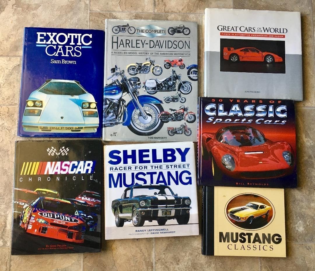 Lot 9 Large Books Ferrary Ford Exotic Sport Cars Harley: Lot of 9 Coffee Table Books all Hardcovers Exotic Sport Cars, Harley Davidson History of motocycles, Mustang & Shelby Classics, Nascar Chronicle etc. Please see pictures for details. In house shipping