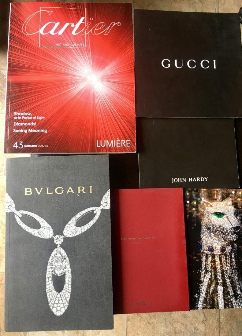 Lot of 5 Cartier Bvlgari John Hardy Catalogs: 2 Cartier catalogs, one Bulgari, one John Hardy and Gucci booklet reference guide for Signoria collection watches. In house shipping to continental US $8.