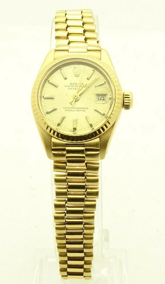 Rolex 6917 OYSTER PERPETUAL DATEJUST 18K GOLD Watch: Rolex 6917 OYSTER PERPETUAL DATEJUST 18K Yellow GOLD Ladies Watch. Fits about 5.5" wrist. Case diameter: 26mm. Band Width: 12mm. Case Thickness: 10mm. Weight: 63.1g/40.6dwt. Movement﻿: Automati