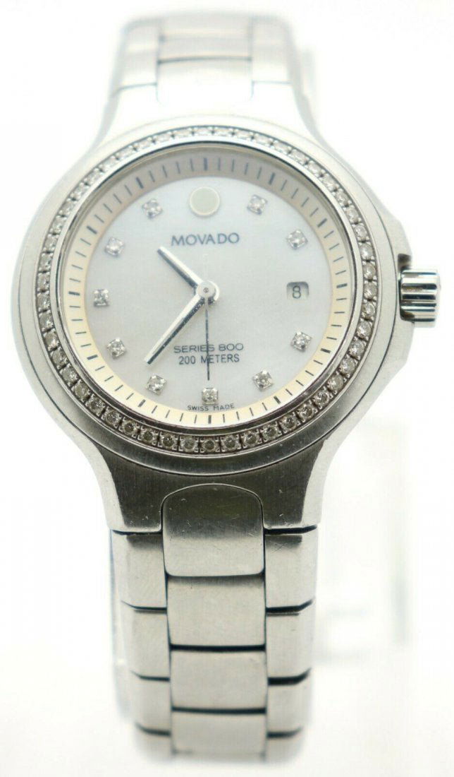 MOVADO SERIES 800 Ladies Swiss Diamond Bezel Watch: MOVADO SERIES 800 Ladies Swiss Diamond Bezel 84 36 1832S Watch. Water Resistance: 200 m (20 ATM). Case Size: 30 mm. Watch Size: 7.5". Weight: 53.4 dwt & 82.9 grams. 50 round diamonds 0.01ct each. Come