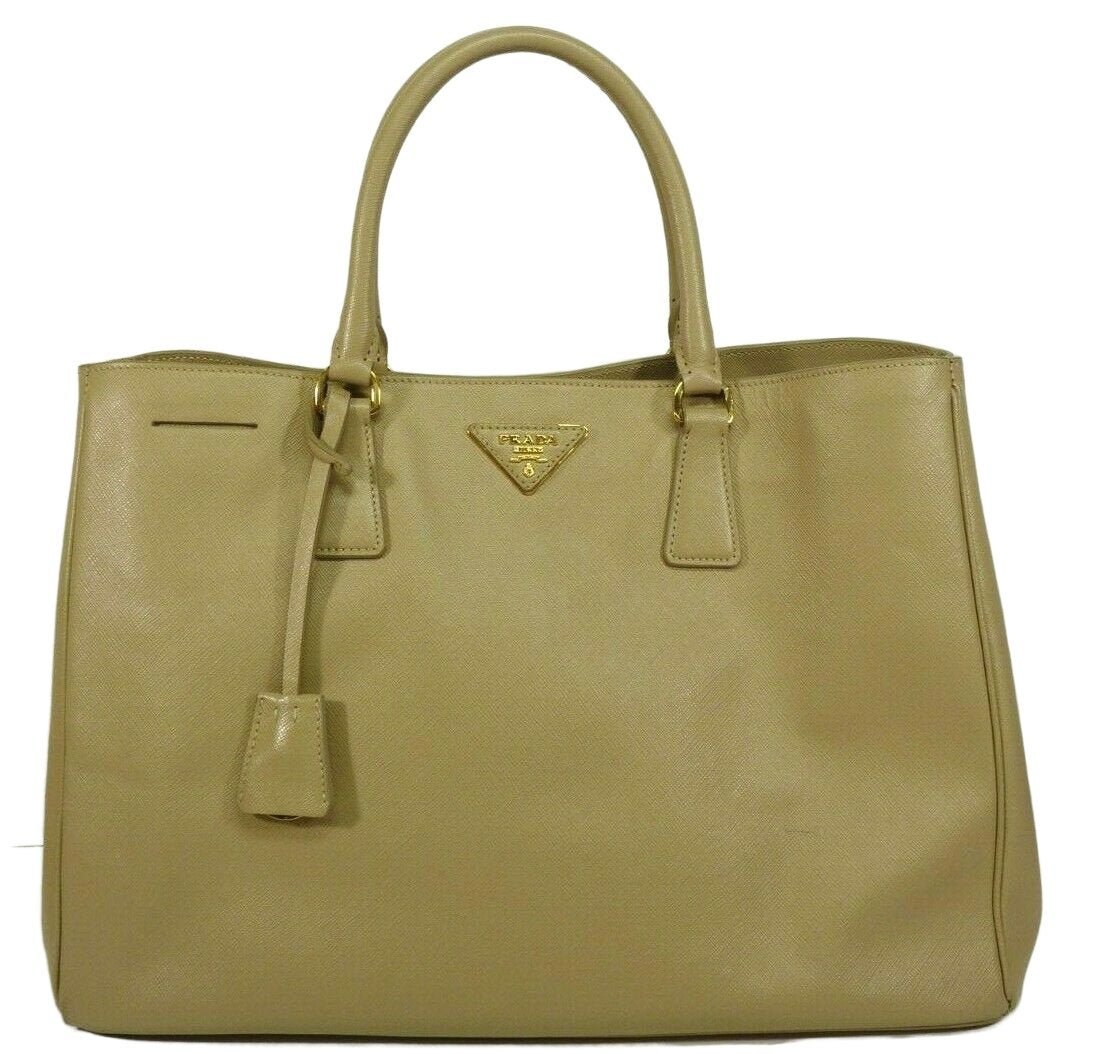Prada Galleria Saffiano Sabbia Large Leather Tote Bag: Prada Galleria Saffiano Sabbia Large Leather Tote Bag Model BN1844 NZV 13641. retail price $1550. Mint condition. Size 15" x 9.5" x 7.5".