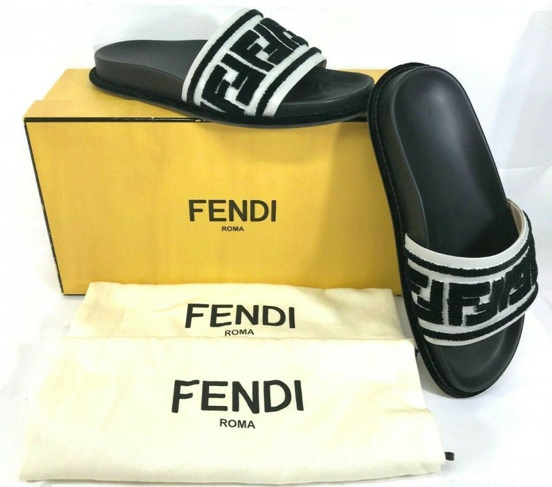 Fendi Logo Embellished Leather Slides In Black Size 8.5: Ladies Fendi Logo-Embellished Leather Slides In Black Size US 8.5 / EUR 38.5. Come with box and dust bag. Excellent condition. Retail price was $690, this Model Is Out Of Stock In Retail. In house shi