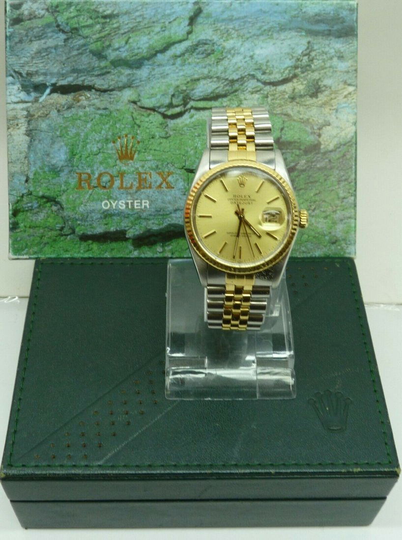 Rolex Datejust 16013 Mens 2 Tone 18K Gold Watch: Rolex Datejust 16013 Mens 2 Tone 18K Gold Stainless Steel Champagne Jubilee Band. Case Diameter: - 36 mm. Comes with box. In house shipping is available, buyer pays shipping cost.