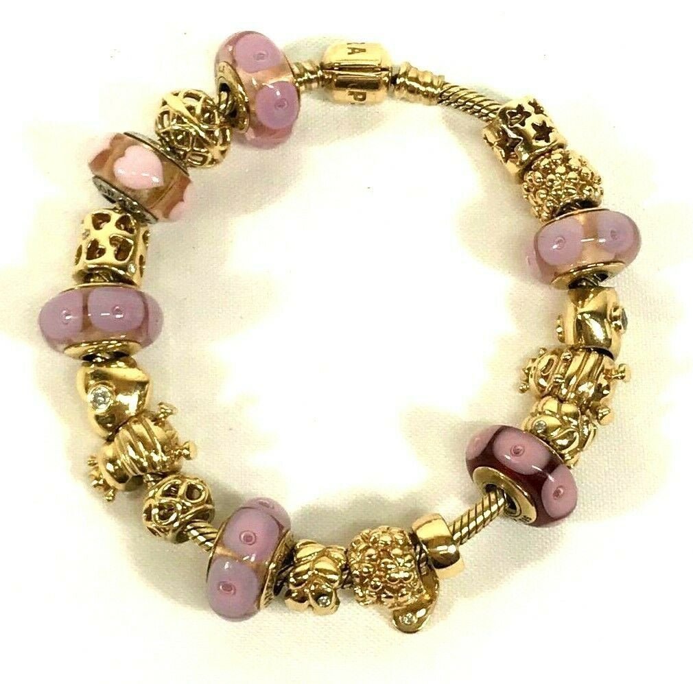PANDORA 585 ALE 14K Gold Bracelet With 19 Charms: PANDORA 585 ALE 14K Gold Bracelet With 19 Charms Size 8". Weight 49.1 dwt / 76.4 g. Mint condition. In house shipping is available, buyer pays shipping cost.