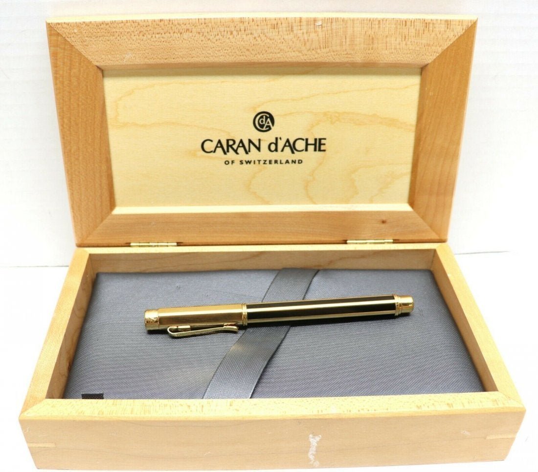 Caran D'ache Gold plated VARIUS CHINA BLACK roller pen: Caran D'ache Gold-plated VARIUS CHINA BLACK roller pen. Very good condition Comes with wooden case and papers. In house shipping is available, buyer pays shipping cost.
