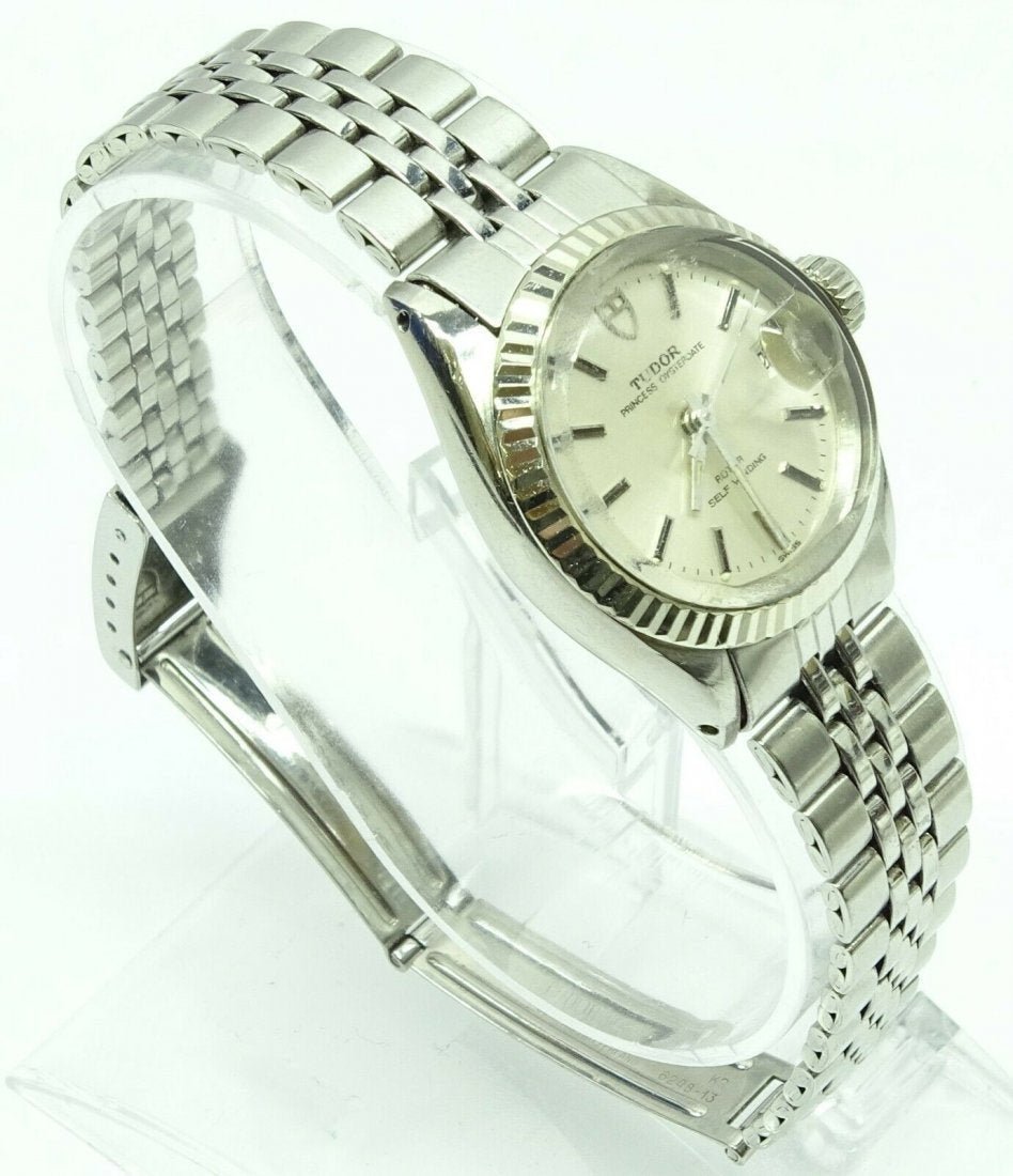 TUDOR Prince Oysterdate 78910 Date Automatic Watch: TUDOR Prince Oysterdate 78910 Date Automatic Stainless Steel 1987 Watch. Jubilee Band. Case size: 23 mm. Wrist size: apprx 5.5". Band Width: 13 mm. Weight: 38.5 g/24.8 dwt. Watch is running, the cryst