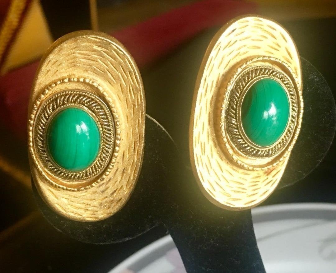 Vintage Les Bernard Clip on Earrings Gold Tone Green: Vintage Les Bernard Large Clip on Earrings Gold Tone with Green Stone. Measures 2"L x 1.25"W. In house shipping to continental US $10.