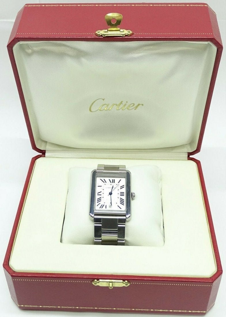 Cartier Tank Solo XL Mens Automatic Watch Stainless Ste: Cartier Tank Solo XL Mens Automatic Watch Stainless Steel. Model W5200028 3515. Case Size:W 31mm H 40mm. Wrist Size: apprx 6.5". Comes with original box. In house shipping is available, buyer pays shi