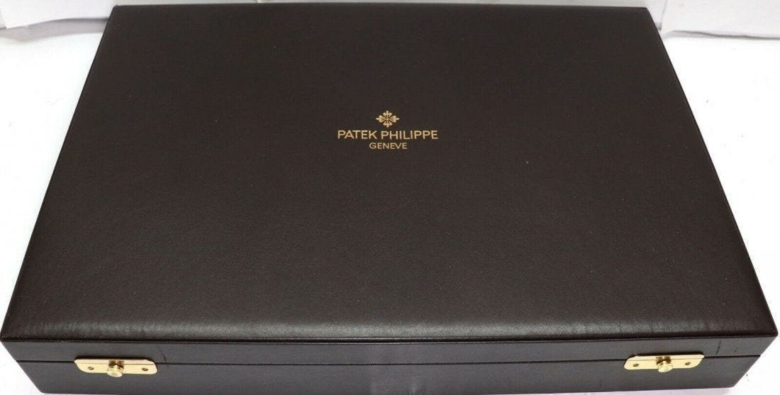 Patek Philippe 12 Watches Travel Storage Case: Patek Philippe 12 Watches Black Leather Travel Storage Case. Made in Switzerland. Measures 11 x 16 x 2 3/4 inch. In house shipping is available, buyer pays shipping cost. House id 01.