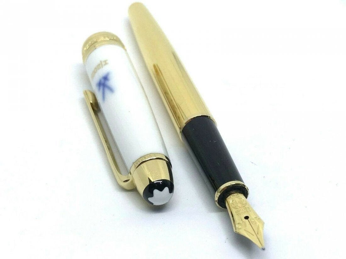 MONTBLANC Meissen EDITION 2005 "VENUS AND AMOR" Pen: MONTBLANC ANNUAL EDITION 2005 "VENUS AND AMOR" Fountain Pen - Meissen Porcelain. Clip 18K gold plate on silver. Body 18K gold plate on brass. Nib 18K gold. Nib size is M . In house shipping is availab