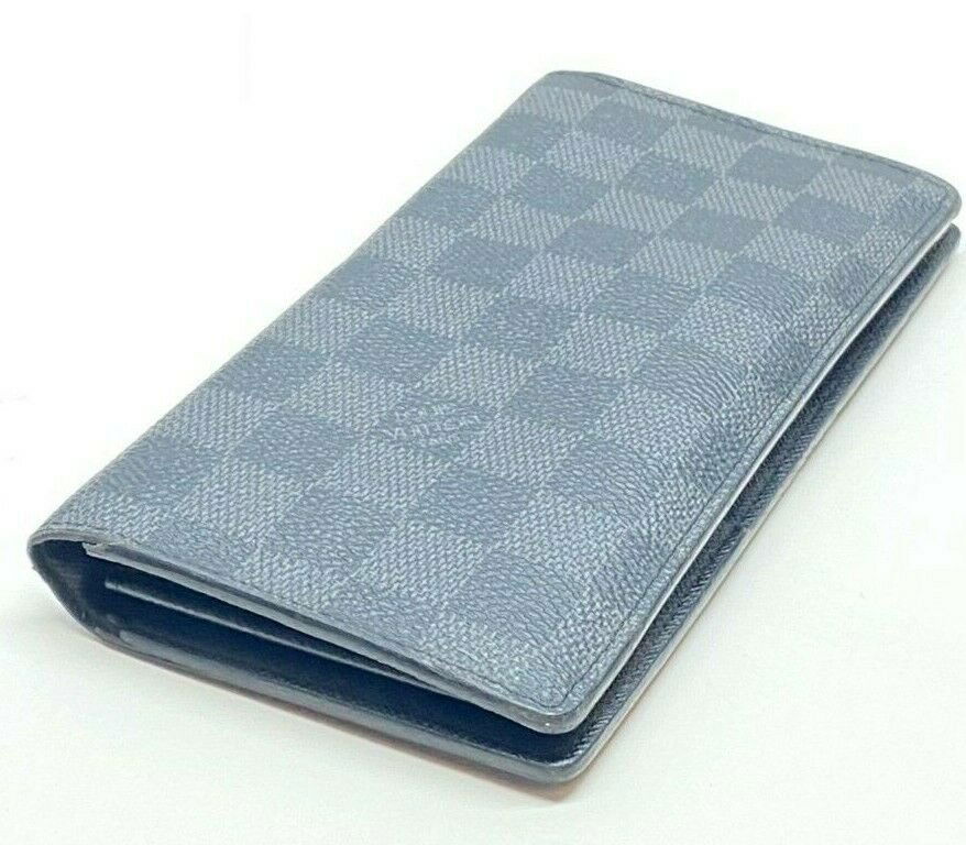 Louis Vuitton Brazza Damier Graphite Canvas Wallet: Louis Vuitton N62665 Brazza Damier Graphite Canvas Wallet. Length- 7.5 inches. Made in France. In house shipping is available, buyer pays shipping cost. House id 01.