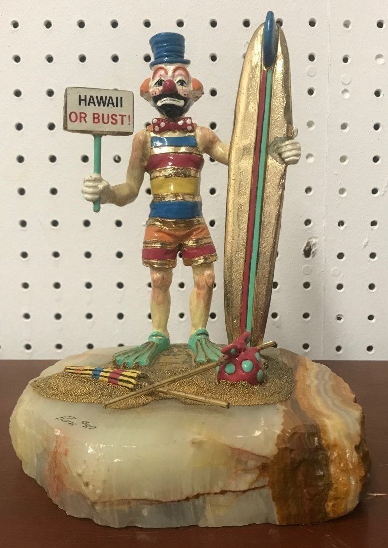 Ron Lee "Hawaii or Bust" Clown Sculpture On Onyx Base: Ron Lee "Hawaii or Bust" Clown Sculpture On Onyx Base. Limited Edition. Measures 9"H x 7" dia. In house shipping is available, buyer pays shipping cost.
