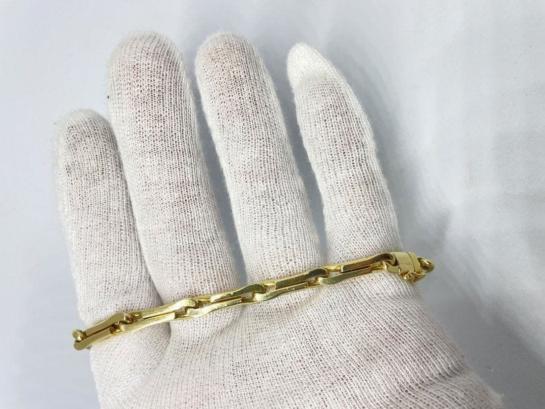 CHIMENTO 18K GOLD MENS BRACELET 8": CHIMENTO 18K GOLD MENS BRACELET Size 8". HALLMARKED 408VI. WEIGHT 20.0DWT/31.1GRAMS In house shipping is available, buyer pays shipping cost.Many lots are available for "Buy Now". Please contact us if