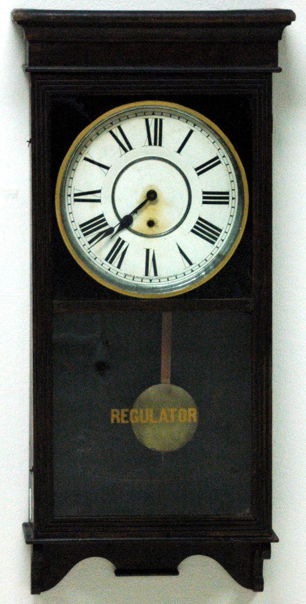 Sessions Regulator Wall Clock: Sessions regulator wall clock, keywind, pendulum, paper numeric painted face, reverse paint on glass, wood case. L39" x W18" x D4.5". Works, finish and paint crackling.