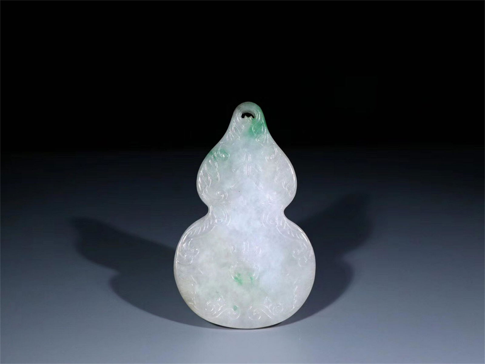 A Chinese Carved Jadeite Pendant (1 of 9)