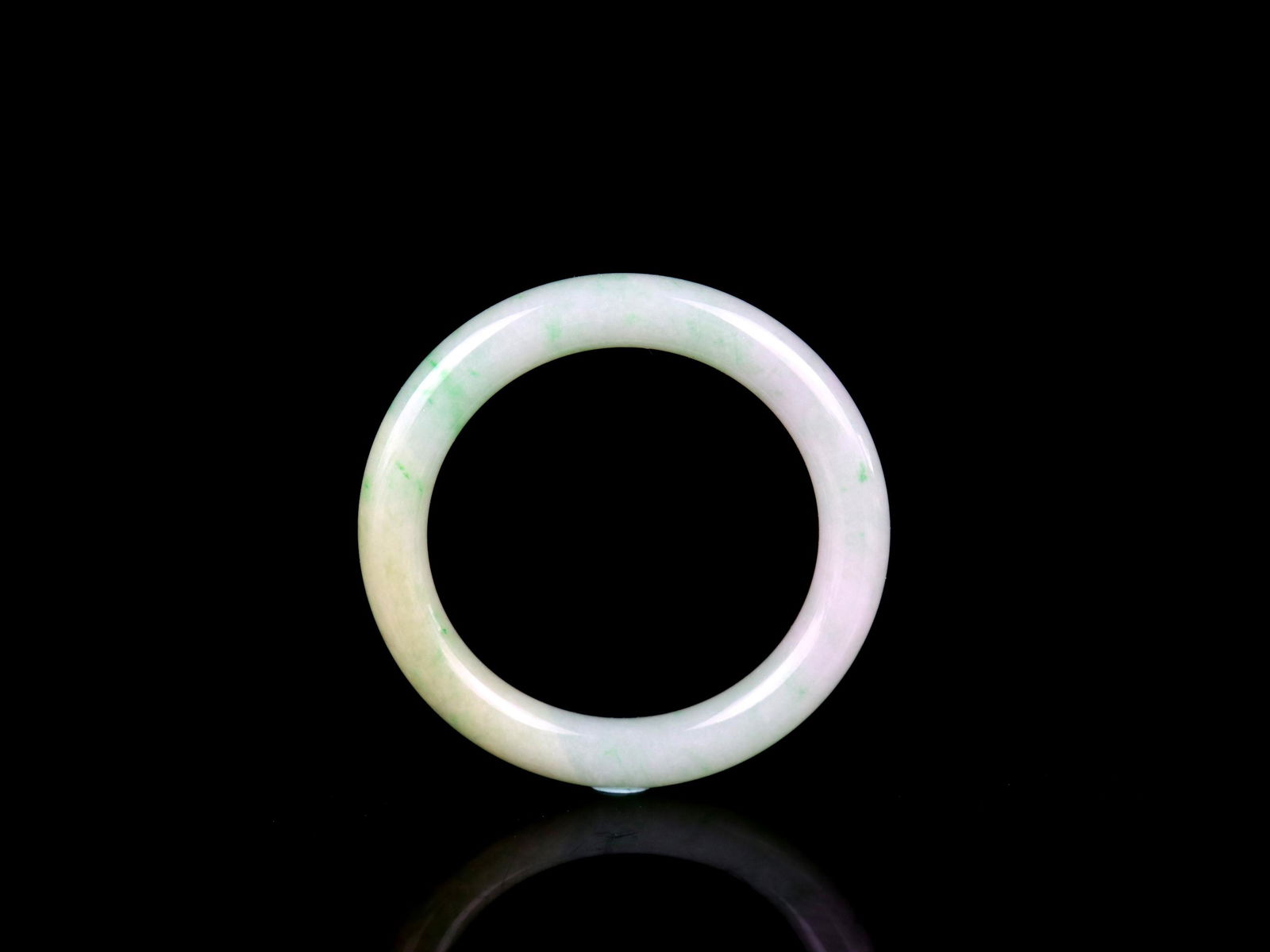 A Chinese Carved Jadeite Bracelet (1 of 3)