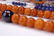 A Chinese Carved Amber Court Necklace - 9