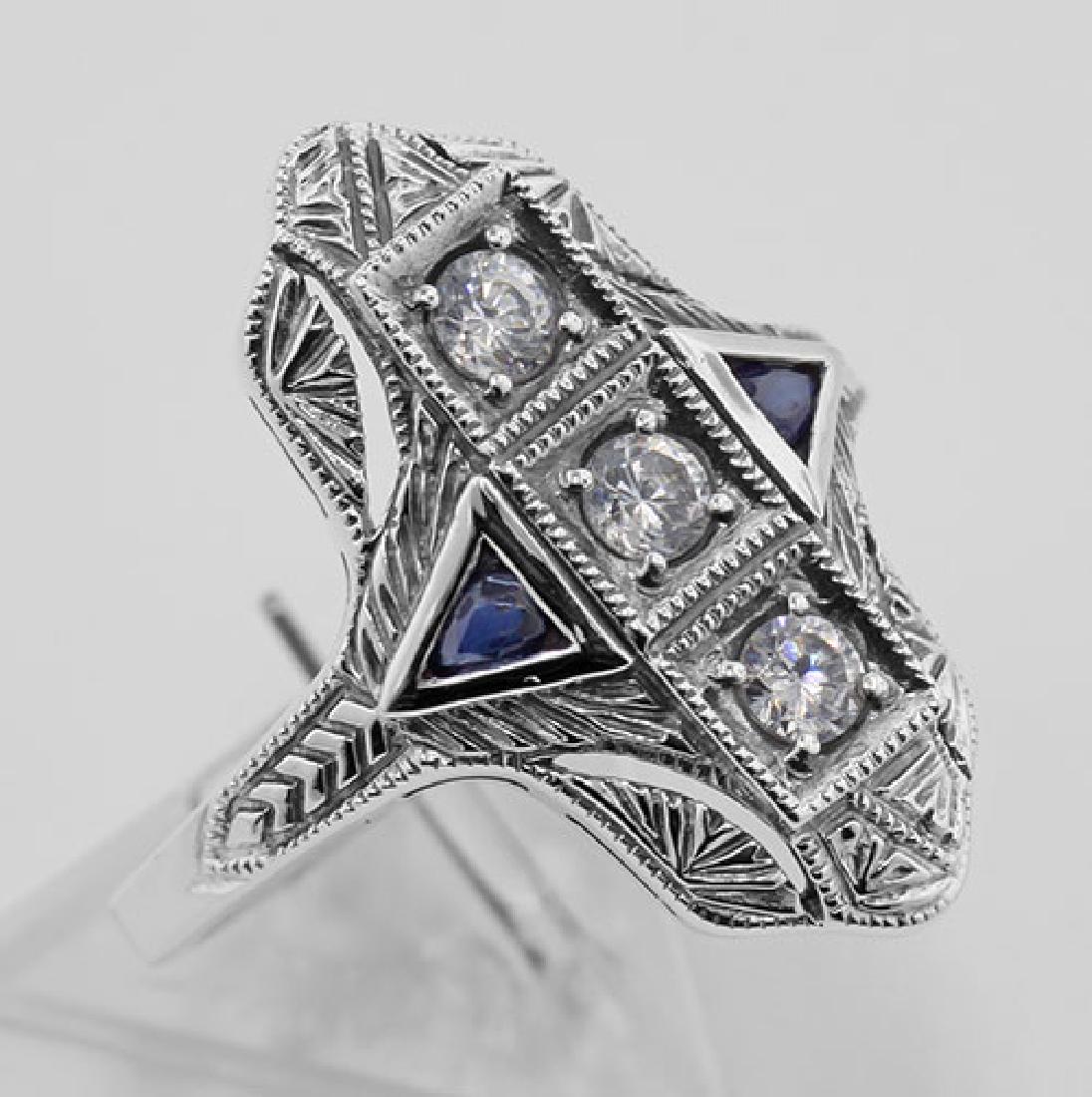 Filigree Ring w/ Sapphire / Crystals - Sterling Silver: Filigree Ring w/ Sapphire / Crystals - Sterling Silver **|**|** #FR-1008 Sterling Silver Filigree Ring w/ Sapphire / Crystals - This beautiful crystal and sapphire 1920s style ring features 3 stacked 