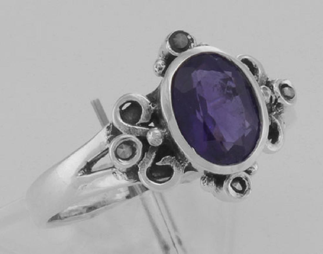 Cute Victorian Style 3/4 Carat Amethyst and Marcasite R: Cute Victorian Style 3/4 Carat Amethyst and Marcasite Ring - Sterling Silver **|**|** #R-392-AM This cute Amethyst Ring features a very nice center mounted Oval Faceted 3/4 Carat Amethyst Gemstone sur