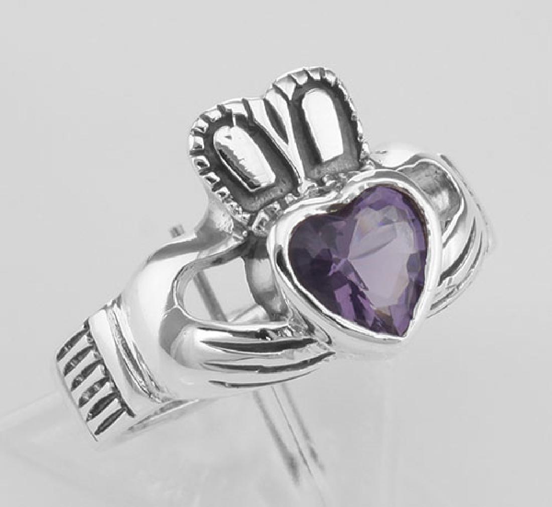 Irish Claddagh Ring with Amethyst CZ - Sterling Silver: Irish Claddagh Ring with Amethyst CZ - Sterling Silver **|**|** #R-249 Sterling Silver Irish Claddagh Ring with Amethyst Colored CZ - The traditional wedding ring of the Irish since the 17th Century t