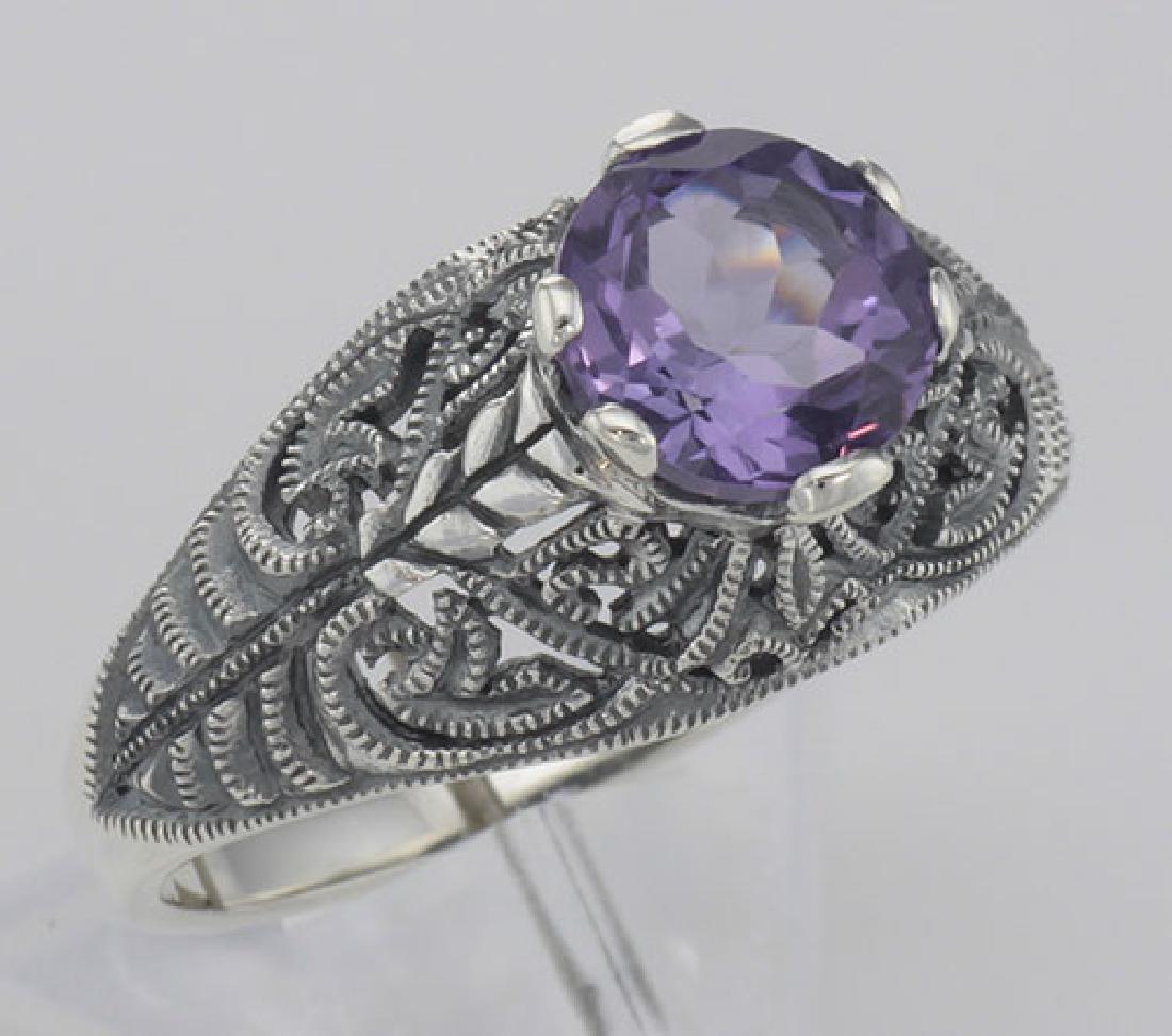 Victorian Style Genuine Amethyst Solitaire Filigree Rin: Victorian Style Genuine Amethyst Solitaire Filigree Ring - Sterling Silver **|**|** #FR-698-AM This beautiful Victorian Style Filigree ring features a prong set approximately 1.15 carat Amethyst gemst