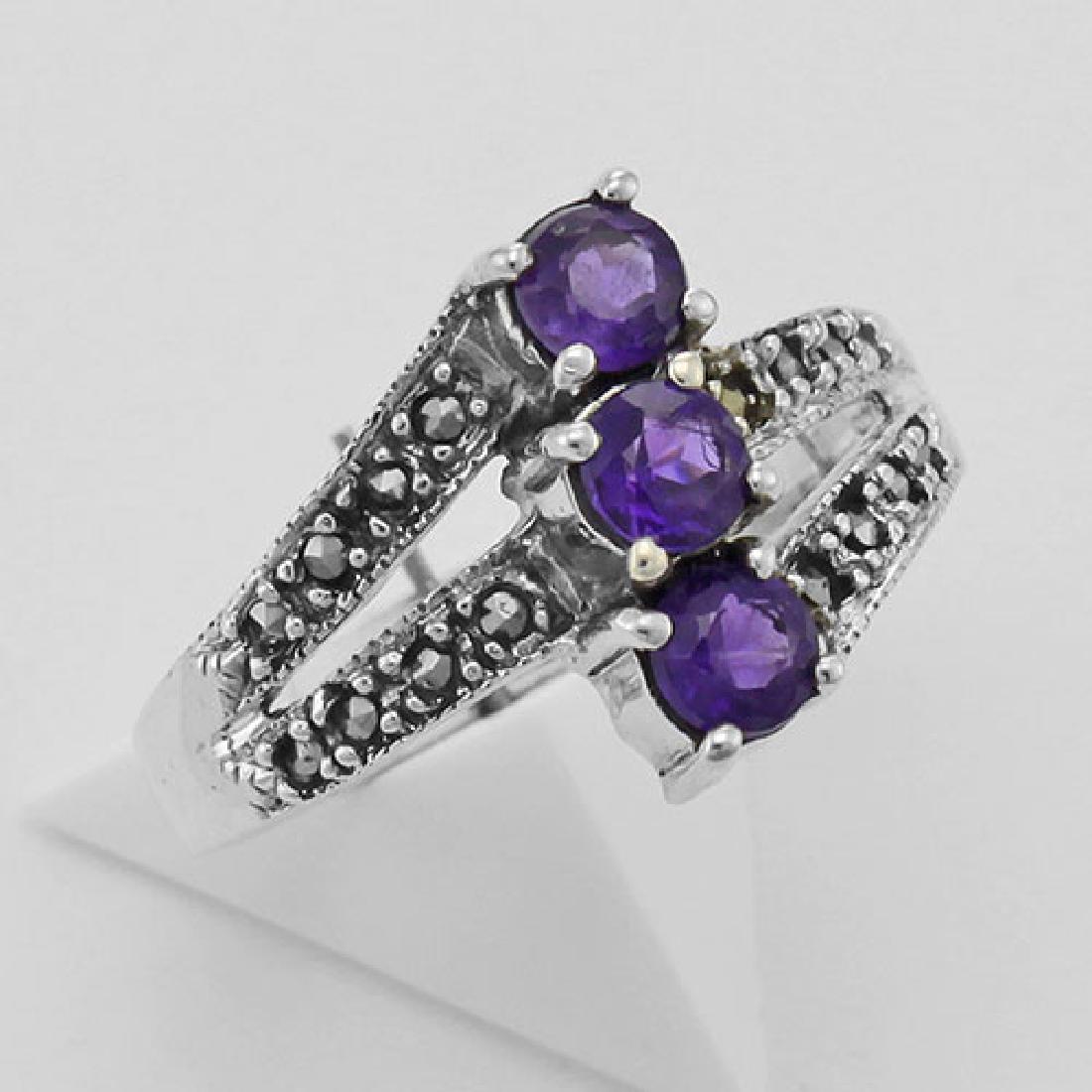 Amethyst Marcasite Ring - Sterling Silver: Amethyst Marcasite Ring - Sterling Silver **|**|** #R-610-AM Metal : Sterling Silver | Stone : Marcasite Amethyst | Style : Ring | Height : 1/2 inch | Width : 3/4 inch | Approximate Weight : 3.9 grams
