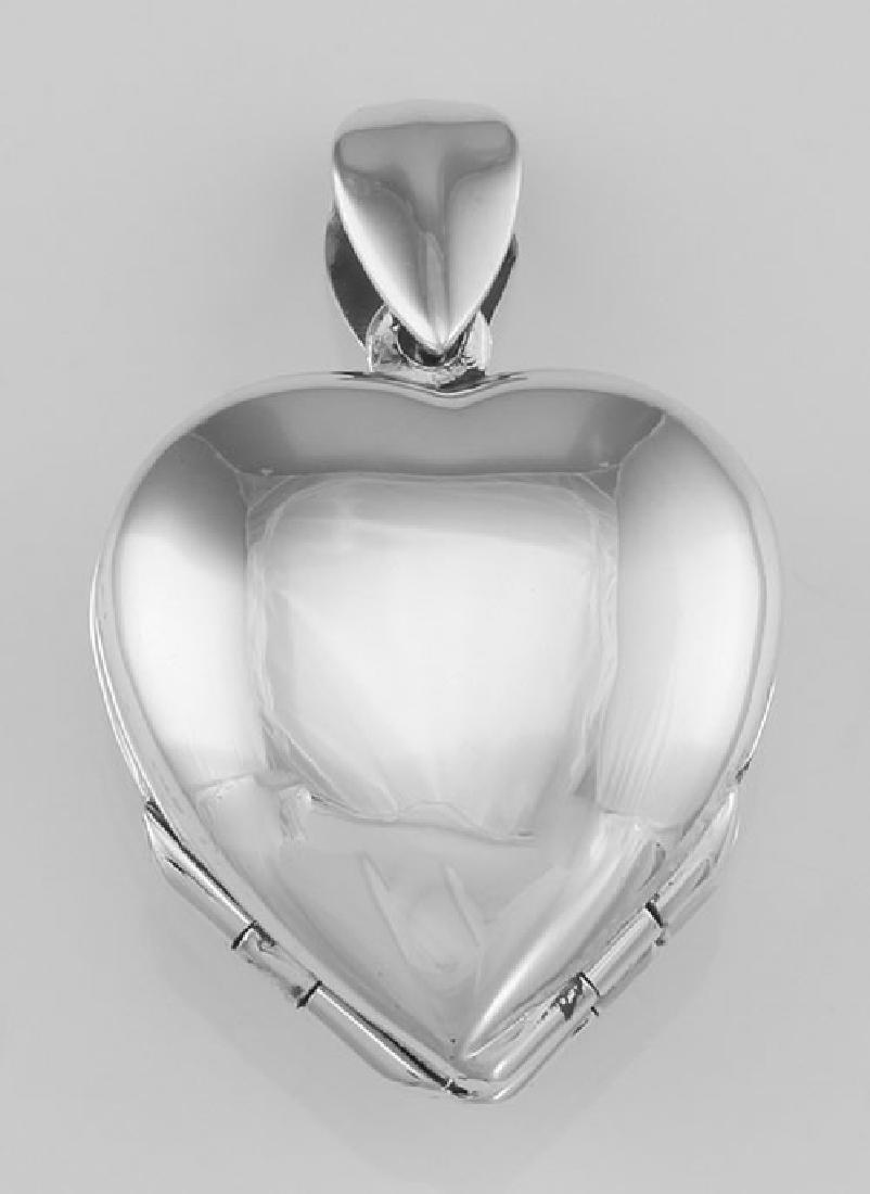 Sterling Silver Heart Locket Engravable - 4 Photo Small: Sterling Silver Heart Locket Engravable - 4 Photo Small Clover **|**|** #HP-6392-P Sterling Silver Heart Locket / Lockets - Engravable - This sterling silver heart locket pendant with a with a smooth 