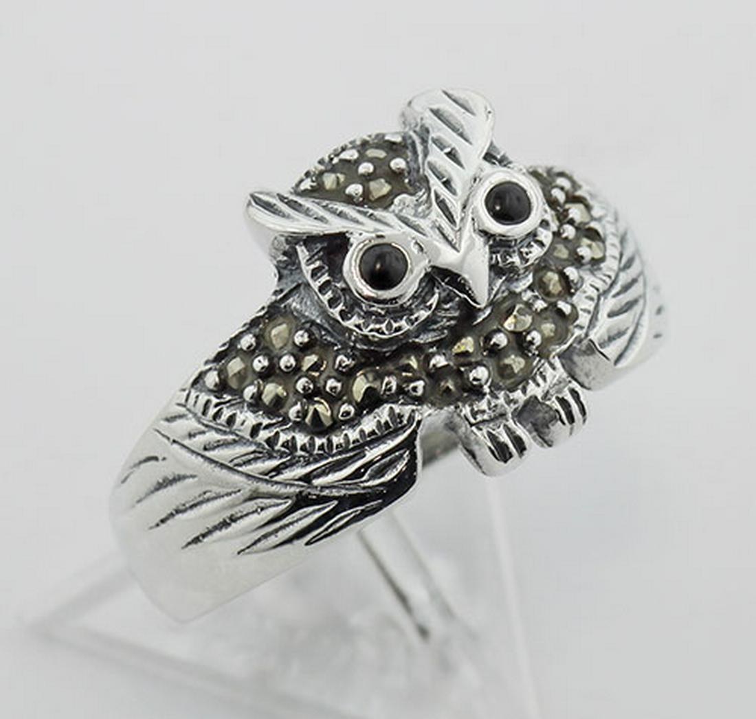 Marcasite Owl Ring w/ Onyx Eyes - Sterling Silver: Marcasite Owl Ring w/ Onyx Eyes - Sterling Silver **|**|** #R-603 Metal : Sterling Silver | Stone : Marcasite Onyx | Shape : Owl | Style : Ring | Height : 1/2 inch | Width : 3/4 inch | Approximate Wei