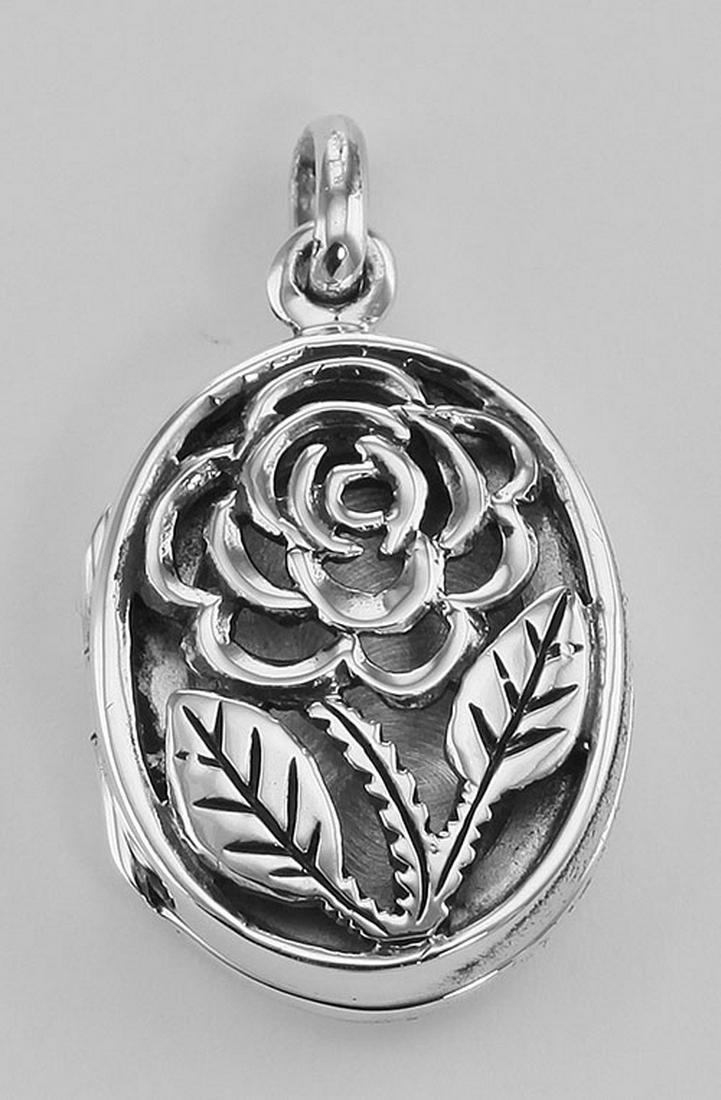 Sterling Silver Filigree Rose Oval Locket - Aromatherap: Sterling Silver Filigree Rose Oval Locket - Aromatherapy Locket **|**|** #HP-814 Sterling Silver Filigree Rose Oval Locket - Aromatherapy Locket. The front of the Oval shaped locket is an openwork Flo