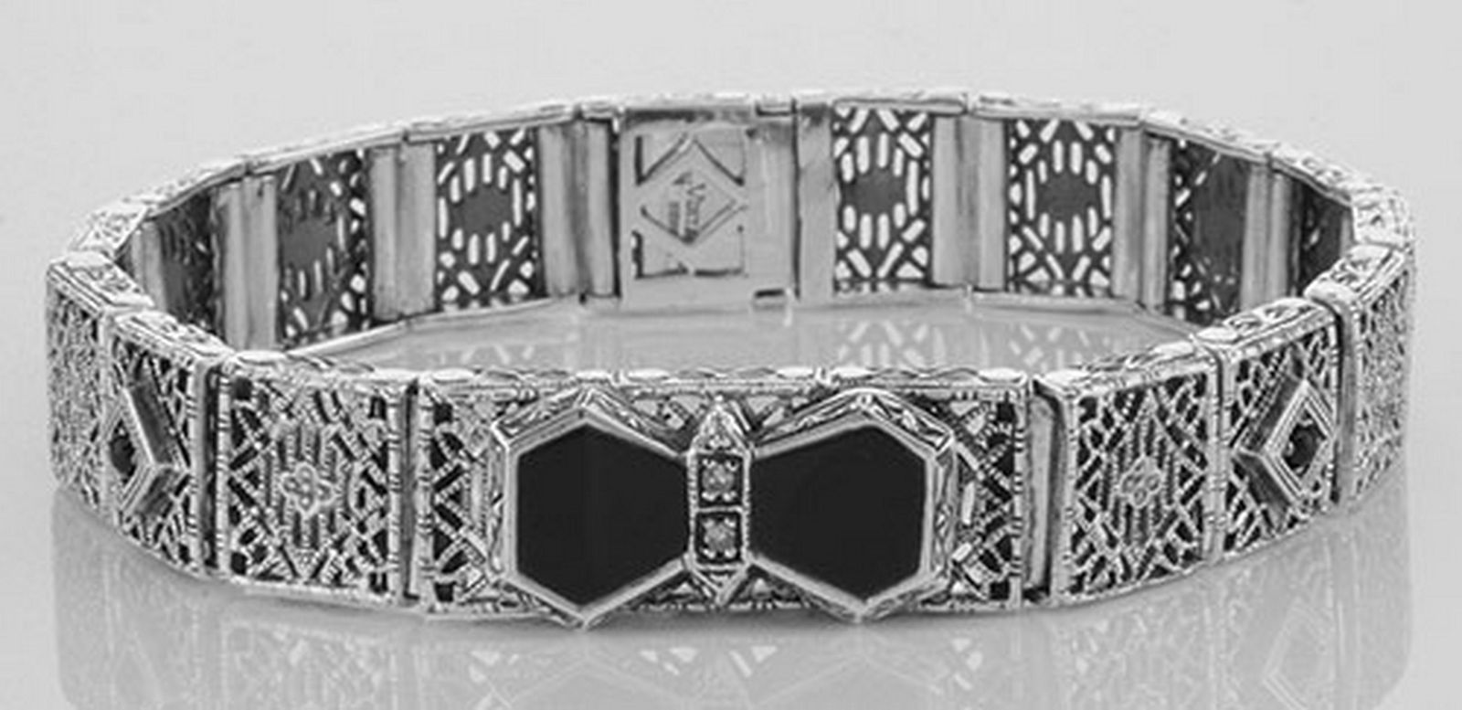 Art Deco Style Filigree Link Bracelet Black Onyx & Diam: Art Deco Style Filigree Link Bracelet Black Onyx & Diamonds Sterling Silver **|**|** #FB-42-O Art Deco Style Onyx and Diamond Filigree Link Bracelet. This unique Sterling Silver link bracelet features
