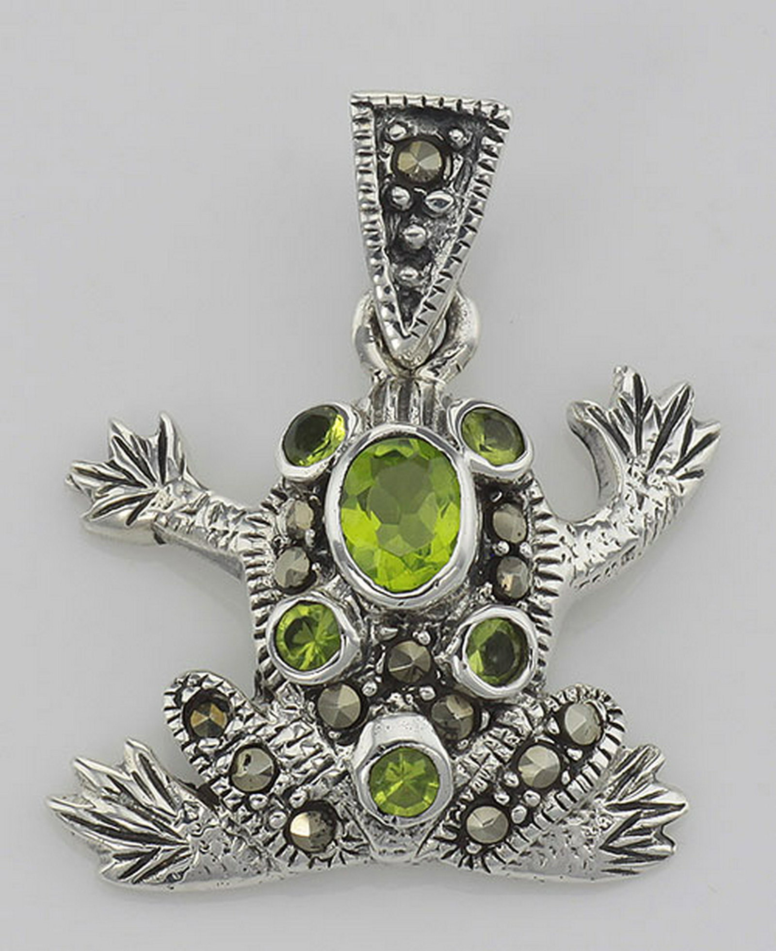 Cute Green CZ and Marcasite Frog Pendant - Sterling Sil: Cute Green CZ and Marcasite Frog Pendant - Sterling Silver **|**|** #HP-791 This cute little Sterling Silver Frog Pendant with Marcasite and Green Cubic Zirconia has a hanging length of approx. 1 inch