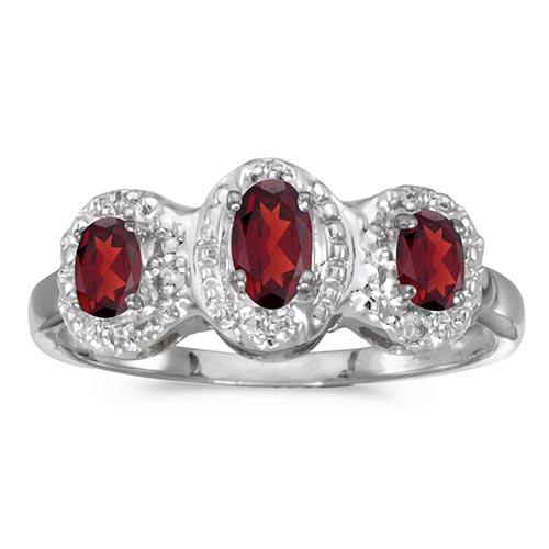 Certified 14k White Gold Oval Garnet And Diamond Three: Certified 14k White Gold Oval Garnet And Diamond Three Stone Ring **|**|** METAL PURITY: 14k ;METAL TYPE: White gold ;GEM TYPE: garnet ;MAIN STONE COLOR: Red ;MAIN STONE SHAPE Oval ;STONE CLARITY: ;ST