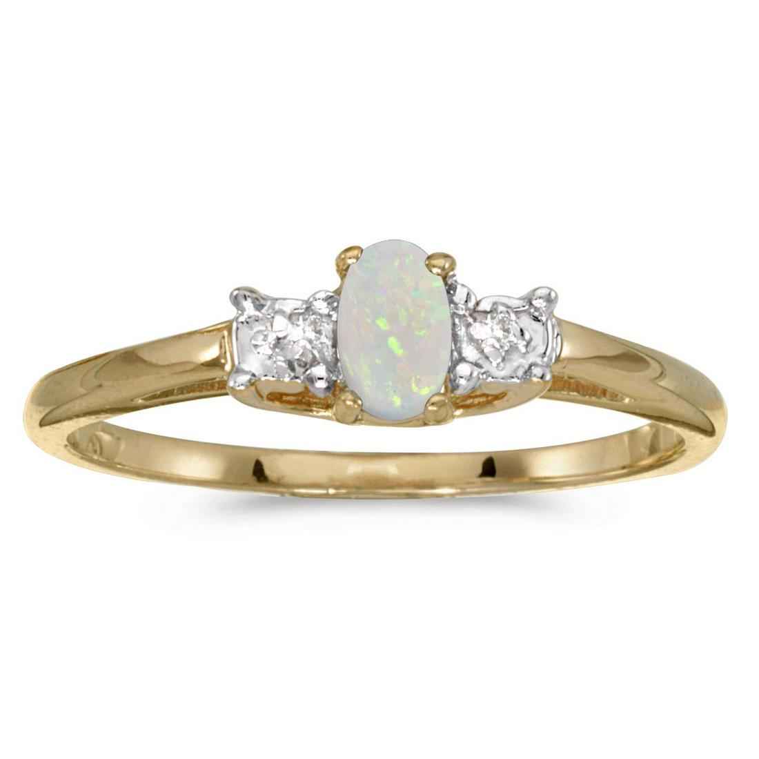 Certified 10k Yellow Gold Oval Rhodolite Garnet And Dia: Certified 10k Yellow Gold Oval Rhodolite Garnet And Diamond Ring 0.24 CTW **|**|** METAL PURITY: 10k ;METAL TYPE: Yellow gold ;GEM TYPE: rhodolite-garnet ;MAIN STONE COLOR: Red ;MAIN STONE SHAPE Oval 