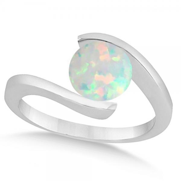 Tension Set Solitaire Opal Engagement Ring 14k White Go: Tension Set Solitaire Opal Engagement Ring 14k White Gold 1.00ctw **|**|** CENTER STONE; Opal CENTER STONE CLARITY; Eye Clean CENTER STONE COLOR; White CENTER STONE SETTING; Tension SIDE STONE CLARITY