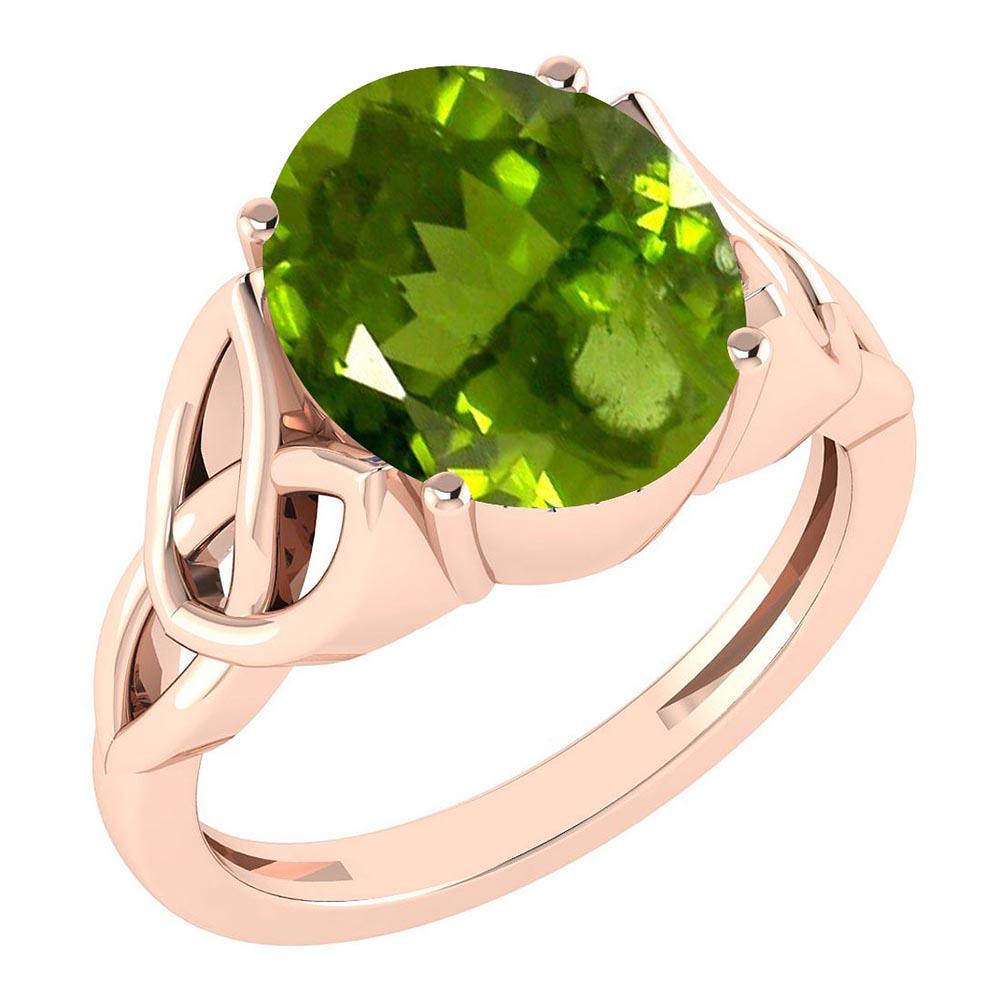 Certified 5.05 Ctw Peridot 14K Rose Gold Solitaire Ring: Certified 5.05 Ctw Peridot 14K Rose Gold Solitaire Ring MADE IN USA **|**|** Center Stone Approx Weight ; 5.05 Ctw (1 Pcs Oval) Center Stone Color: Peridot Center Stone Setting ; Bezel Metal Weight Ap