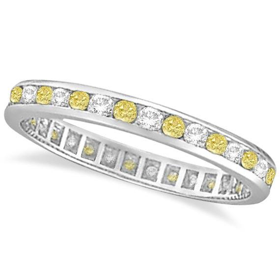 Channel-Set Yellow and White Diamond Eternity Ring 14k: Channel-Set Yellow and White Diamond Eternity Ring 14k W Gold 1.00ctw -- CENTER STONE; Diamond CENTER STONE CLARITY; SI CENTER STONE COLOR; Fancy Yellow CENTER STONE SETTING; Channel SIDE STONE CLARIT