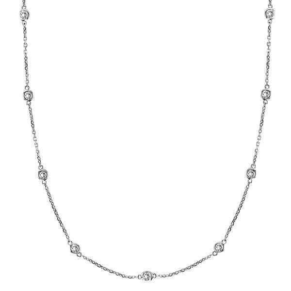 Station Bezel-Set Necklace in 14k White Gold 1.00ctw: Station Bezel-Set Necklace in 14k White Gold 1.00ctw -- CENTER STONE; Diamond CENTER STONE CLARITY; SI CENTER STONE COLOR; J-K CENTER STONE SETTING; Bezel SIDE STONE CLARITY; SIDE STONE COLOR; SIDE ST