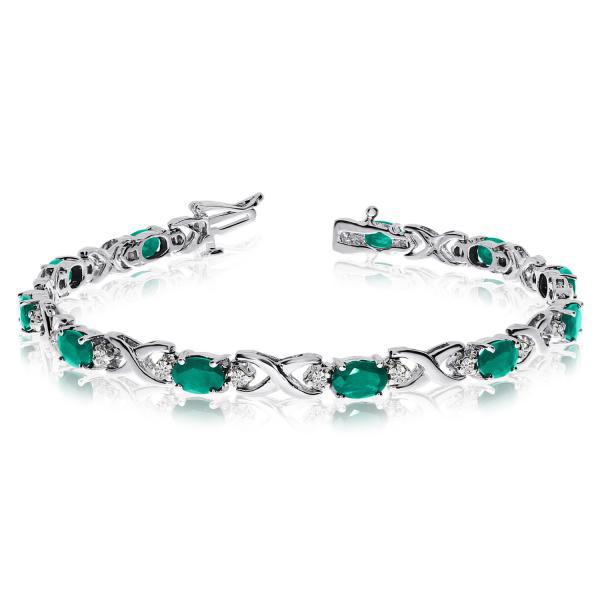 Oval Emerald and Diamond XOXO Link Bracelet 14k White G: Oval Emerald and Diamond XOXO Link Bracelet 14k White Gold 7.00ctw -- CENTER STONE; Emerald CENTER STONE CLARITY; CENTER STONE COLOR; Green CENTER STONE SETTING; Prong SIDE STONE CLARITY; SI SIDE STON