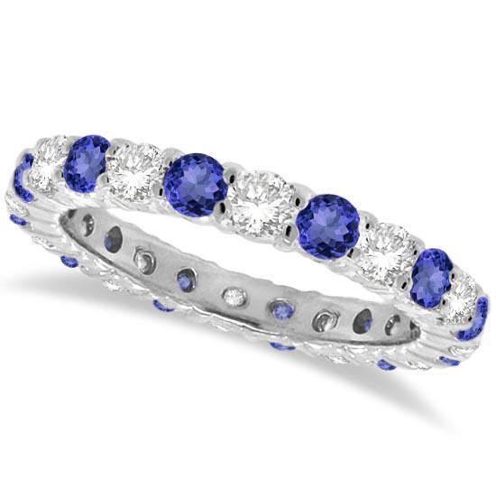 Tanzanite and Diamond Eternity Ring Band 14k White Gold: Tanzanite and Diamond Eternity Ring Band 14k White Gold 1.07ctw -- CENTER STONE; Tanzanite CENTER STONE CLARITY; CENTER STONE COLOR; CENTER STONE SETTING; Prong SIDE STONE CLARITY; SI SIDE STONE COLOR