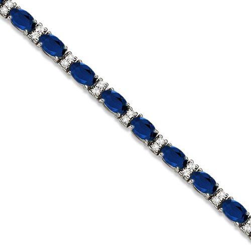 Diamond and Oval Cut Sapphire Tennis Bracelet 14k White: Diamond and Oval Cut Sapphire Tennis Bracelet 14k White Gold 9.25ctw -- CENTER STONE; Sapphire CENTER STONE CLARITY; CENTER STONE COLOR; Blue CENTER STONE SETTING; Prong SIDE STONE CLARITY; SI SIDE ST