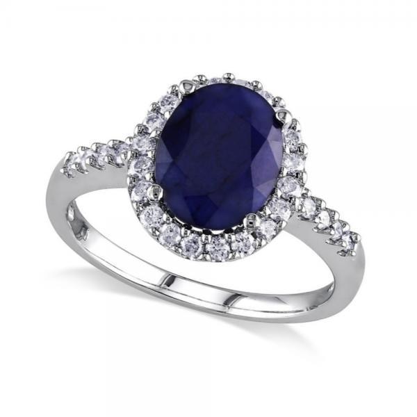 Oval Blue Sapphire and Halo Diamond Engagement Ring 14k: Oval Blue Sapphire and Halo Diamond Engagement Ring 14k W. Gold 3.90ctw -- CENTER STONE; Blue Sapphire CENTER STONE CLARITY; Eye Clean CENTER STONE COLOR; Blue CENTER STONE SETTING; Prong SIDE STONE C