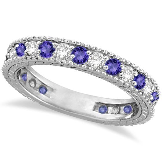 Diamond and Tanzanite Eternity Ring Band 14k White Gold: Diamond and Tanzanite Eternity Ring Band 14k White Gold 1.08ctw -- CENTER STONE; Tanzanite CENTER STONE CLARITY; CENTER STONE COLOR; CENTER STONE SETTING; Prong SIDE STONE CLARITY; SI1-SI2 SIDE STONE 