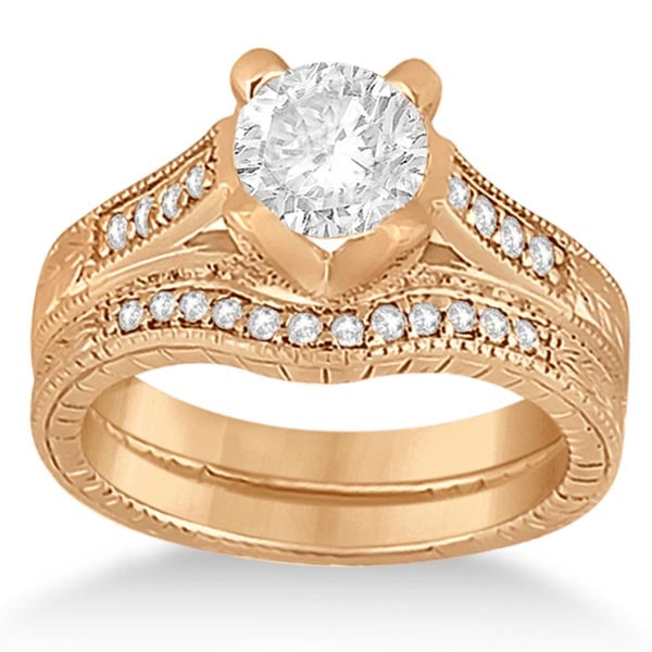 Antique style Style Engagement Ring and Matching Weddin: Antique style Style Engagement Ring and Matching Wedding Band in 14k Rose Gold 1.50 CTW -- CENTER STONE; Diamond (1.00 CTW) CENTER STONE CLARITY; SI1-SI2 CENTER STONE COLOR; J-K CENTER STONE SETTING; 