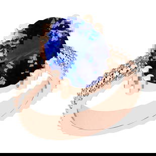 5.94 Ctw VS/SI1 Tanzanite And Diamond 18K Rose Gold Engagement Ring: 5.94 Ctw VS/SI1 Tanzanite And Diamond 18K Rose Gold Engagement Ring -- Center Stone Weight : 5.58 Ctw (Oval Cut) Center Stone Color :-Tanzanite Center Stone Setting : Prong Side Stone Weight Of Ctw 0.